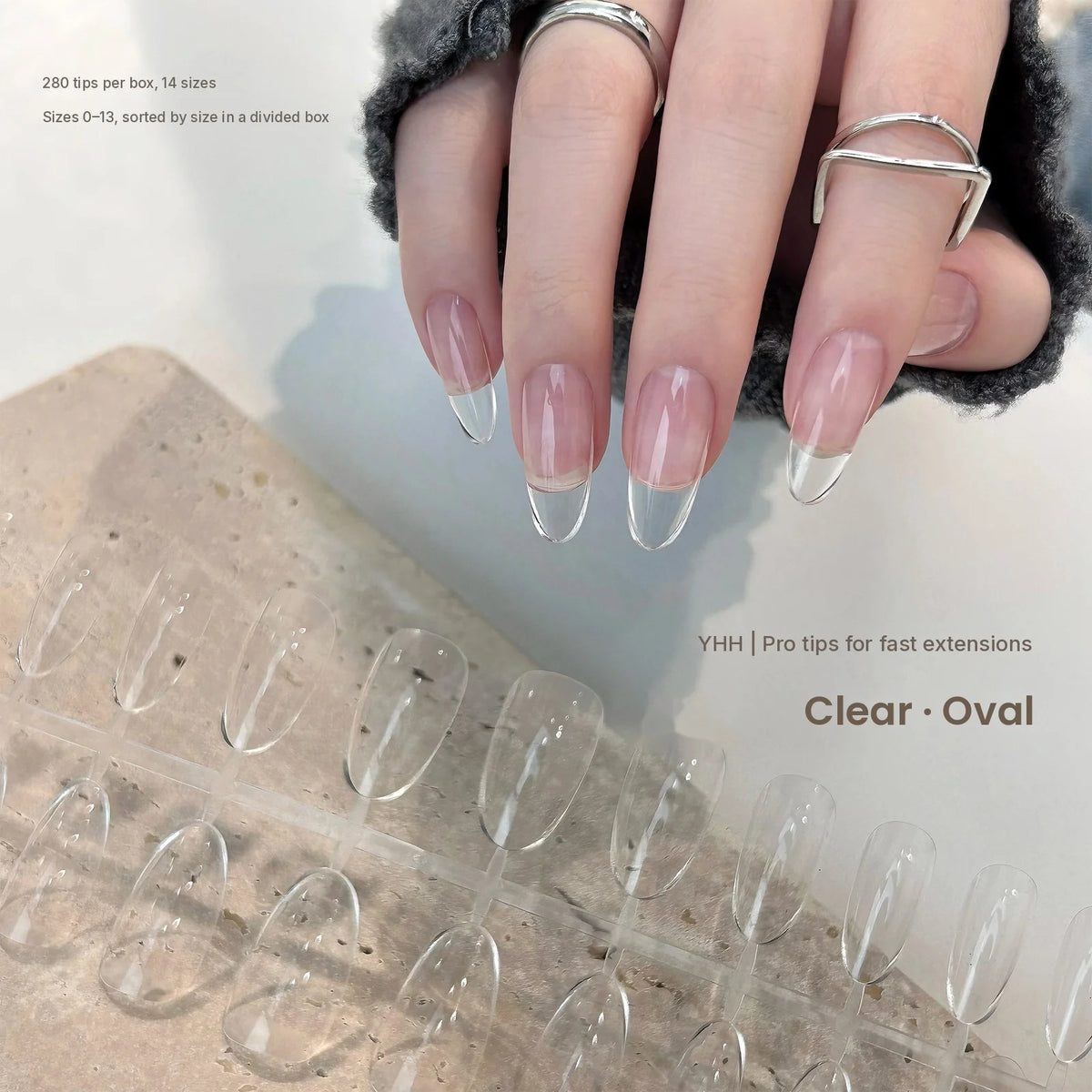YHH clear oval full-cover tips on a hand, 280 tips in 14 sizes