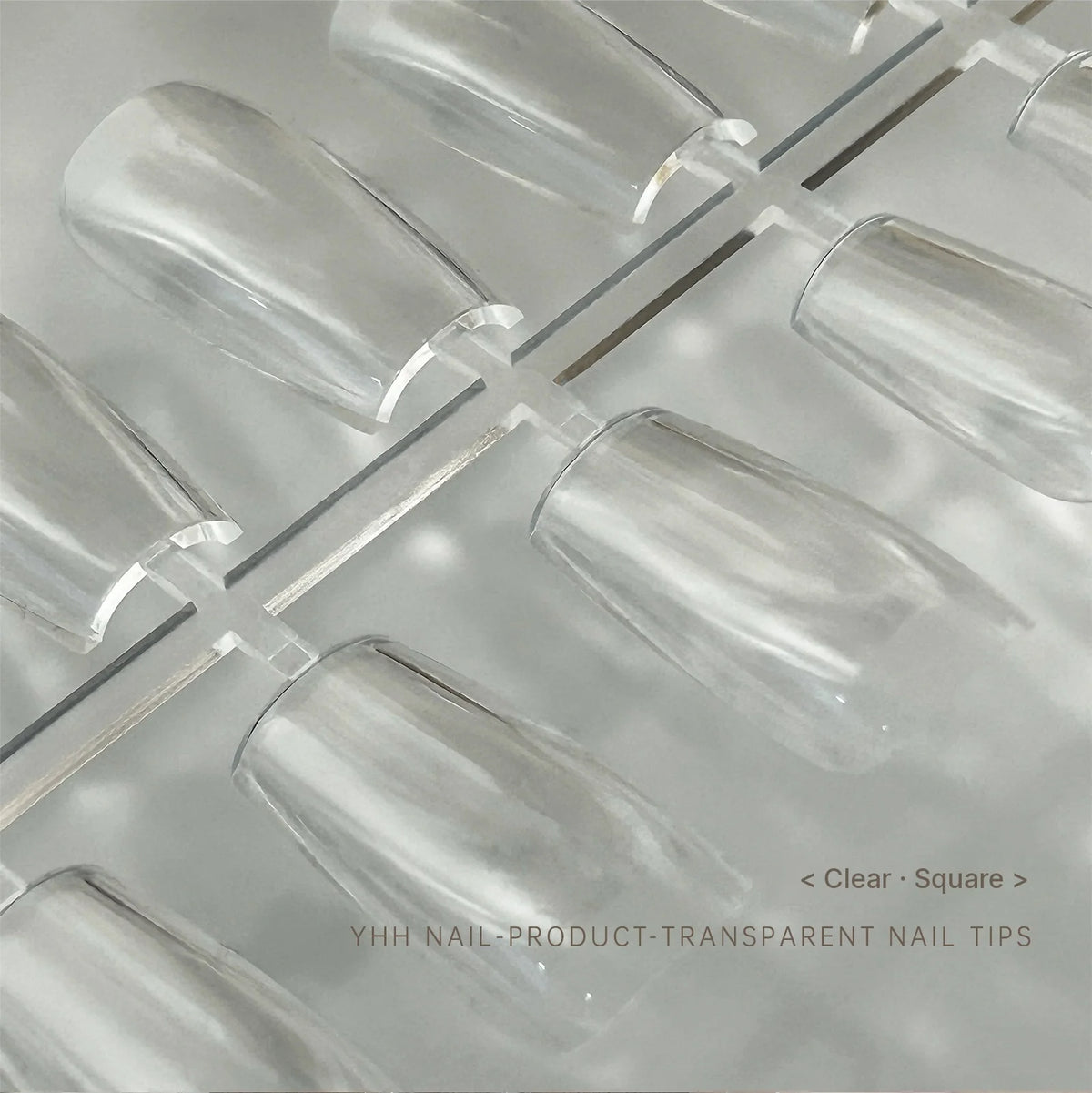 Close-up of YHH clear square full-cover tips on the runner