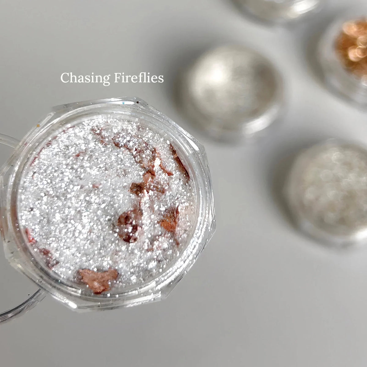 YHH Chasing Fireflies white glitter with copper foil in a jar