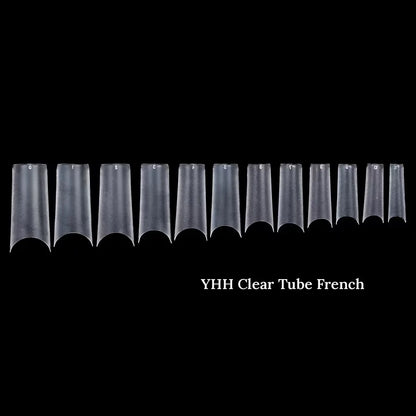 YHH clear tube French nail tips on a runner, black background
