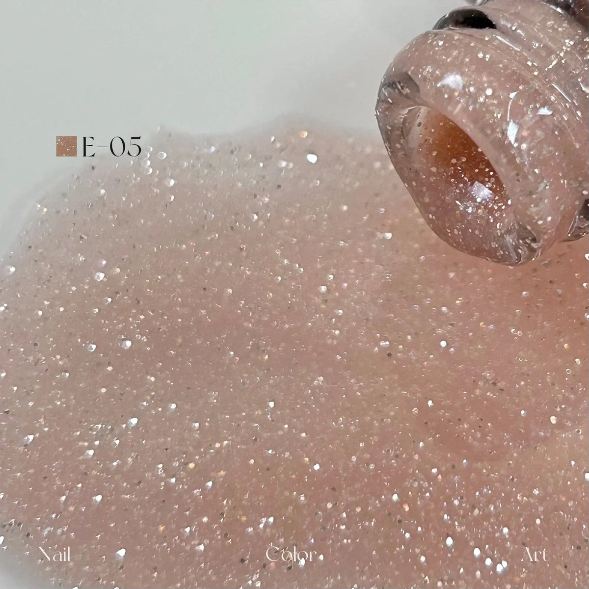 YHH Moonset Star Veil E-05 Peach Blush shimmer gel poured from the bottle