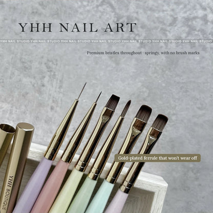 YHH gold-plated brushes showing springy bristles and gold ferrules