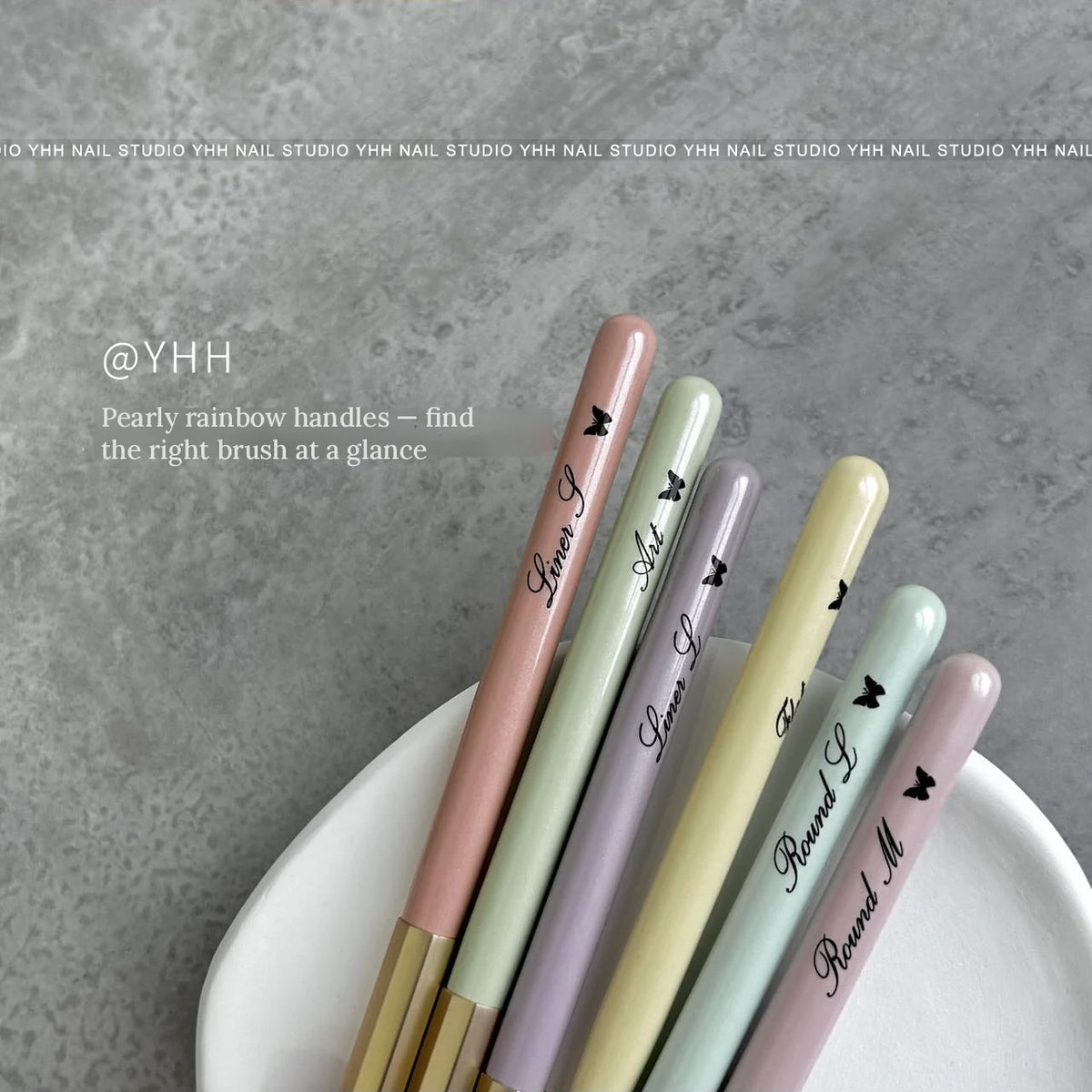 YHH nail brushes with pearly pastel handles printed with each brush name
