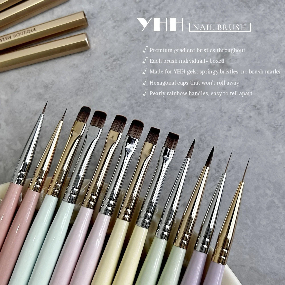 YHH nail art brush set fanned out with pastel handles and English feature list