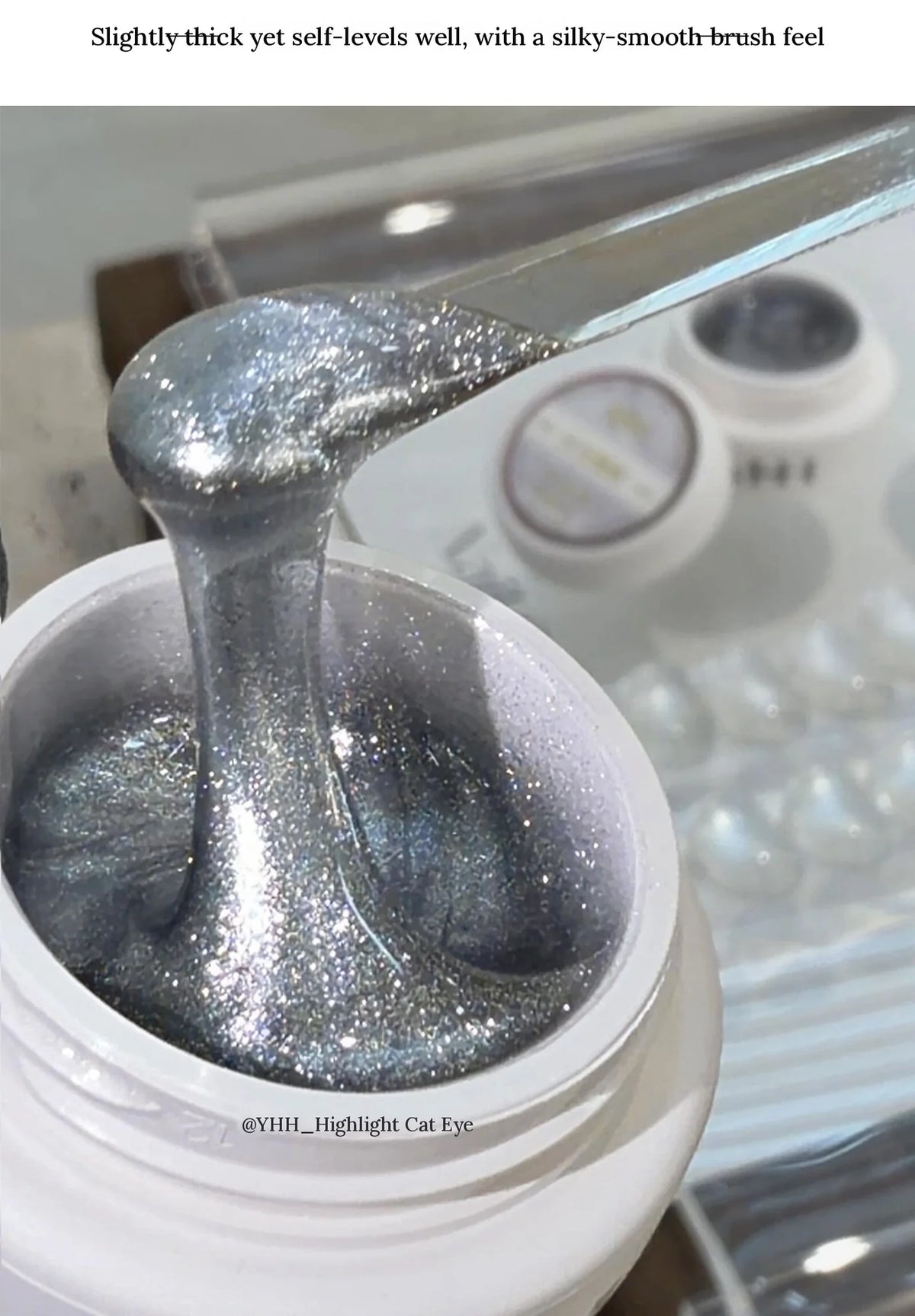 YHH Highlight cat eye gel lifted from the jar, showing its silky texture