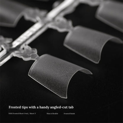 Close-up of YHH frosted short shallow tips with angled-cut tab