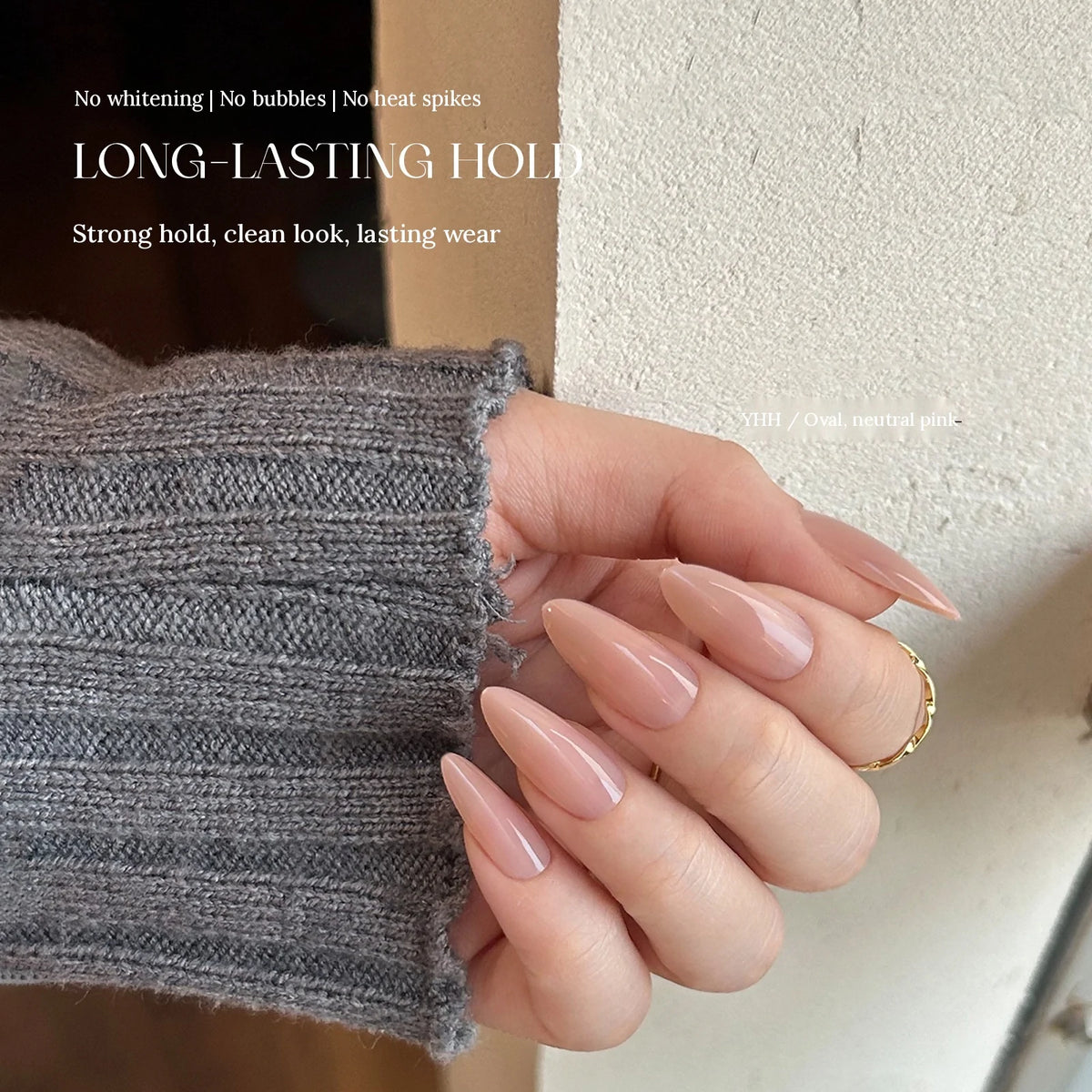Long almond press-on nails in neutral pink applied with YHH Solid Gel