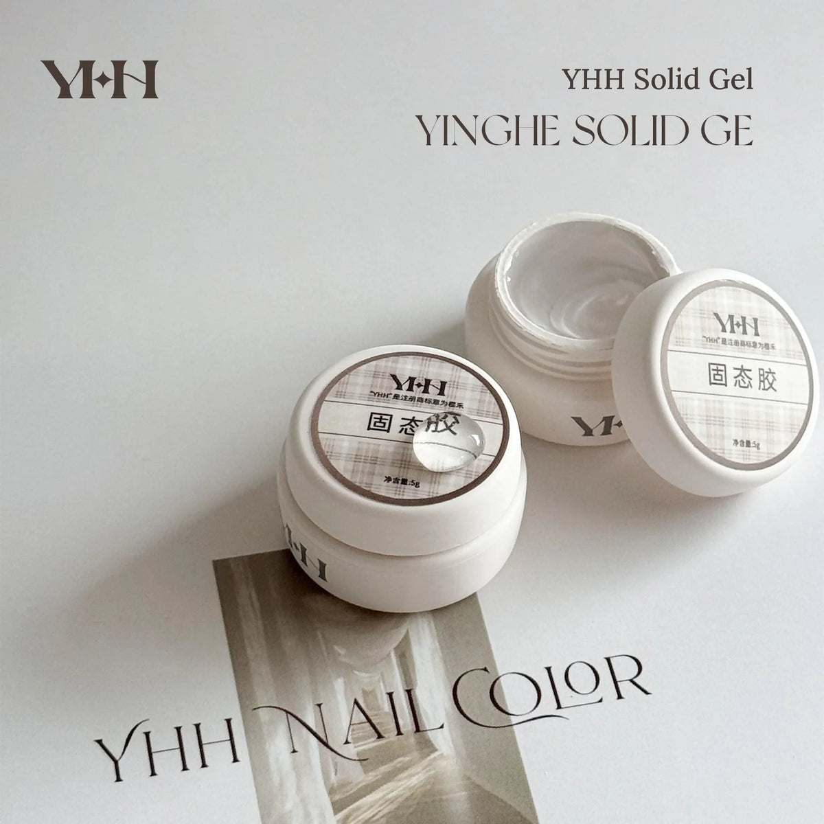 Two jars of YHH Solid Gel tip adhesive
